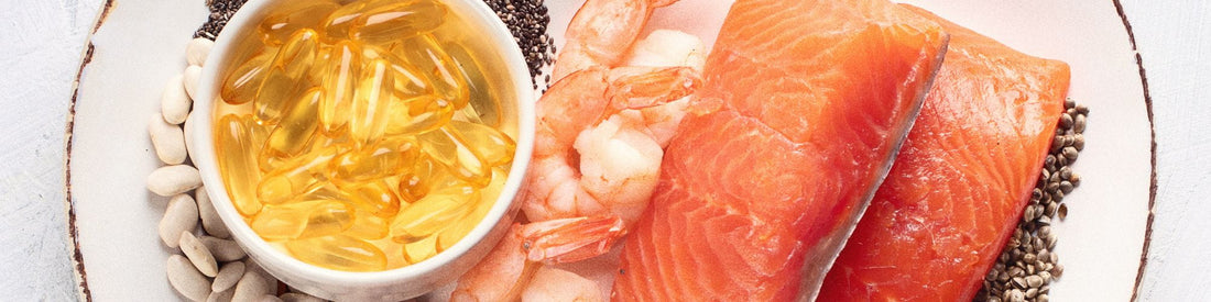 Omega-3 fish oil capsules in a bowl with salmon and seafood, illustrating EPA and DHA sources from supplements and oily fish